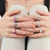 Anel em prata 925 oval central com gotas laterais em turmalina clara