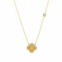Colar dourado com pingente trevo e 1 ponto de zircônia cristal
