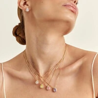 Conjunto dourado oval ametista e zircônias cristal entorno