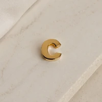 Pingente dourado letra lisa passante