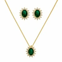 Conjunto dourado oval esmeralda entorno cravejado