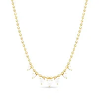 Colar dourado de mini esferas lisas com sete zircônias em formato de gota