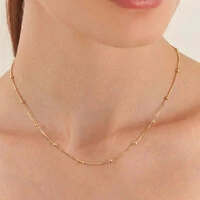 Colar choker dourado esferas intercaladas e lisas