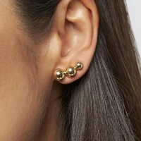 Brinco dourado ear cuff 3 esferas