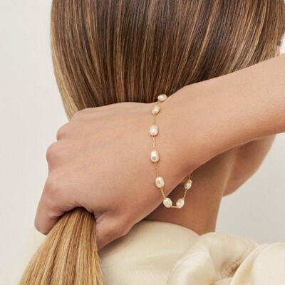 Foto Pulseira dourado onze pérolas barroca intercaladas