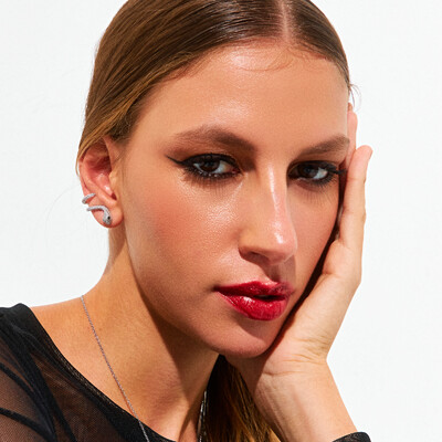 FotoBrinco ear cuff ródio branco snake cravejado cristal com olho esmeralda