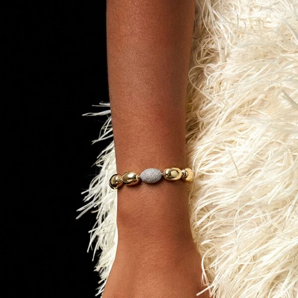 Pulseira dourada ovais lisos e1 oval cravejado zircônia cristal em ródio branco