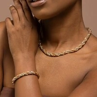 Pulseira Grossa Malha Torcida Três Ouros