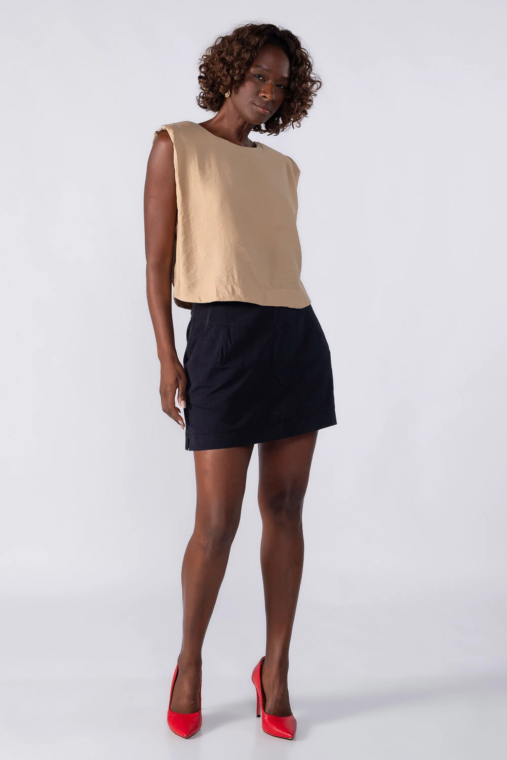 FotoBlusa de alfaiataria com ombreiras