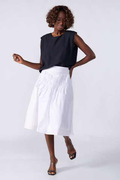 FotoBlusa de alfaiataria com ombreiras