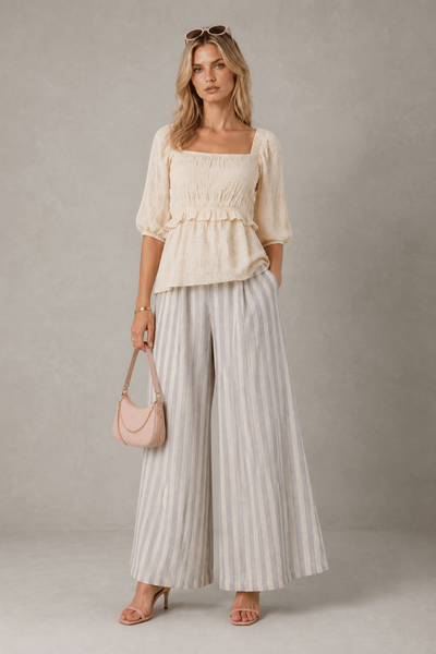 Foto Blusa bata texturizada com lastex