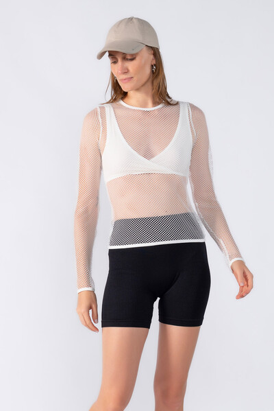 Foto Blusa manga longa em tela com top