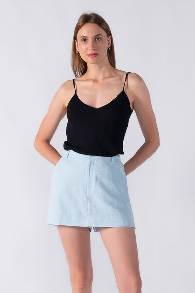 Foto Shorts saia com botao forrado