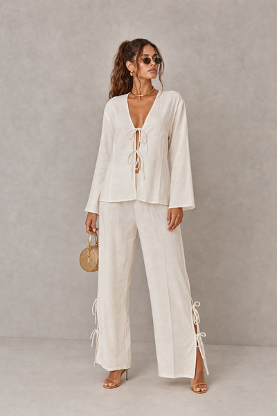 Foto Conjunto blusa e calça com amarração