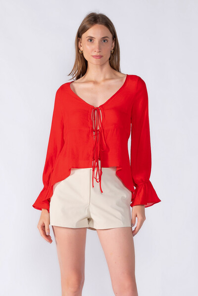 Foto Blusa manga bufante amarracao frontal