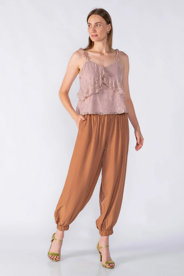 Calca aladim com bolsos