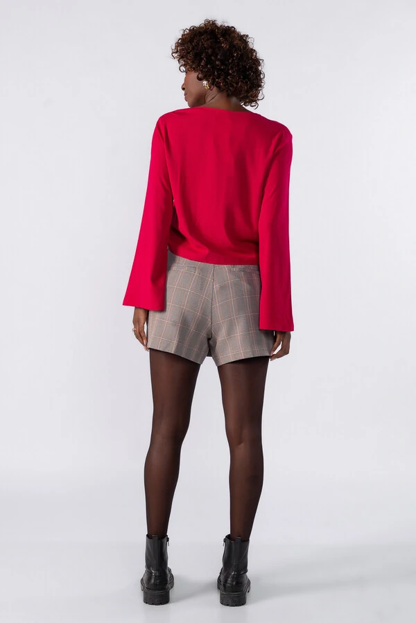 Shorts saia estampa xadrez bolso faca