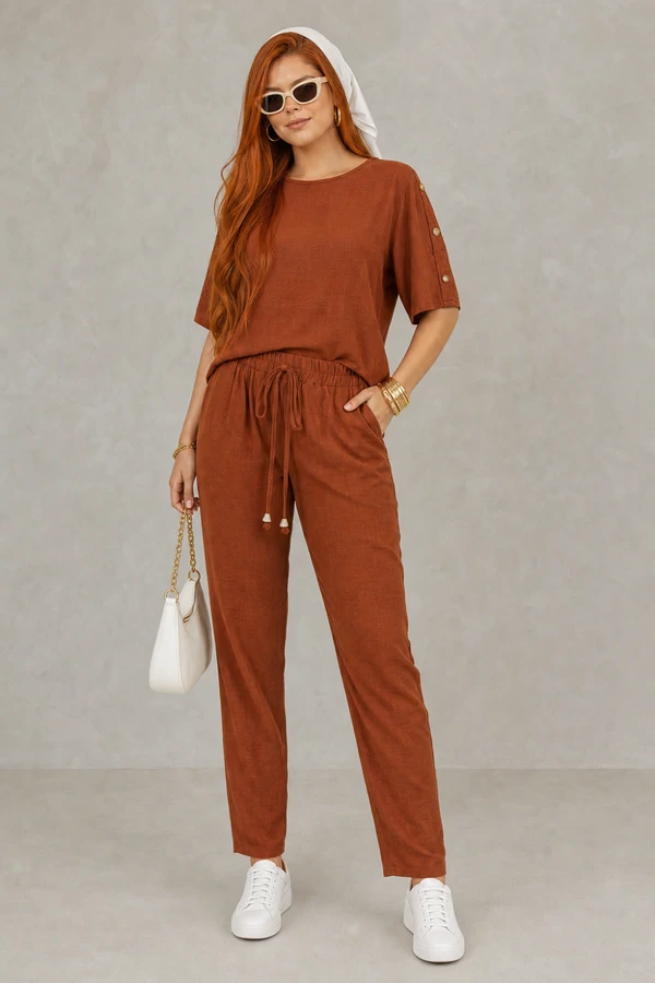 Conjunto calça e blusa com botões e manga