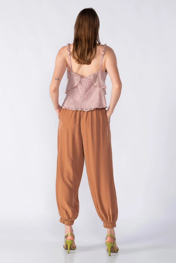 Calca aladim com bolsos