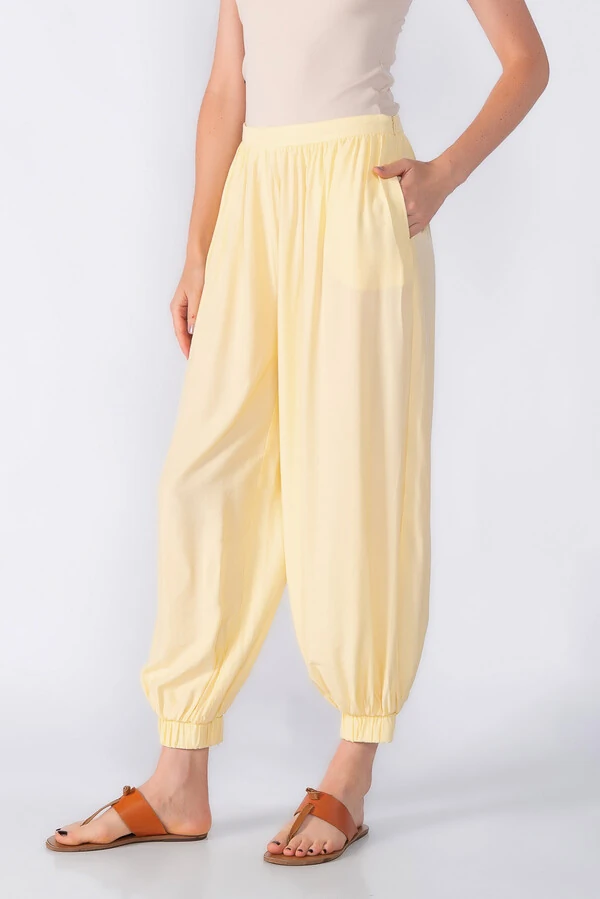 Calca aladim com bolsos