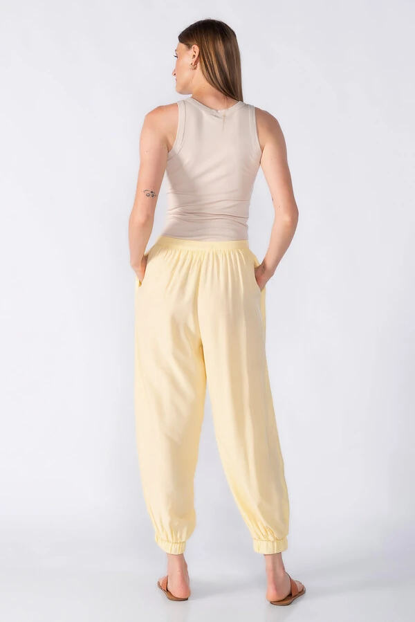 Calca aladim com bolsos