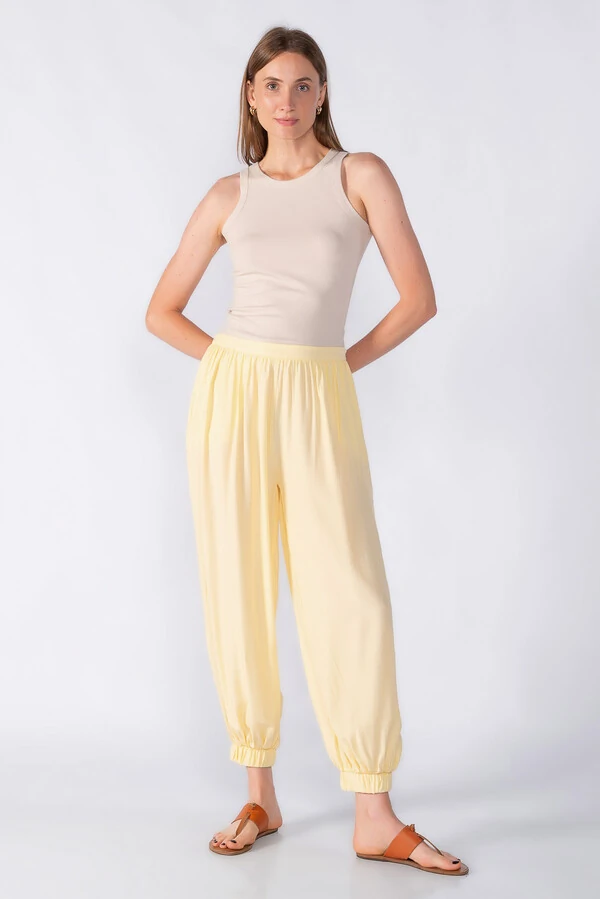 Calca aladim com bolsos