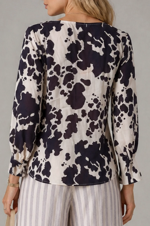 Blusa estampada com babado