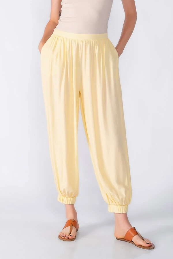 Calca aladim com bolsos