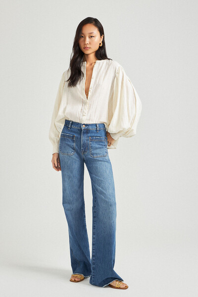 FotoCalça Flare Bolso Jeans Médio