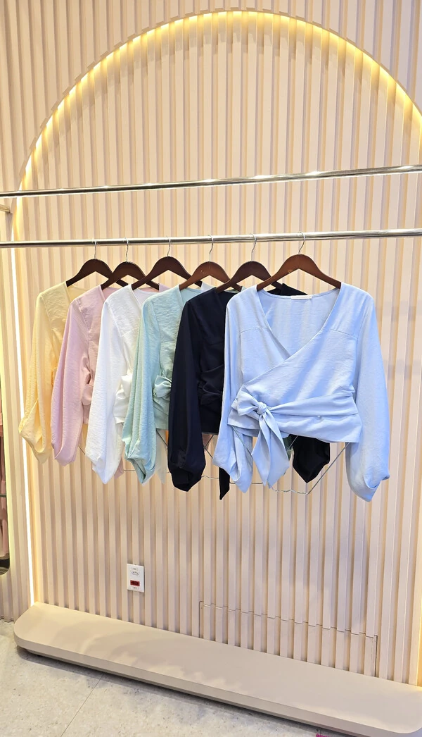 BLUSA TRANSPASSADA CHICLE CURVES