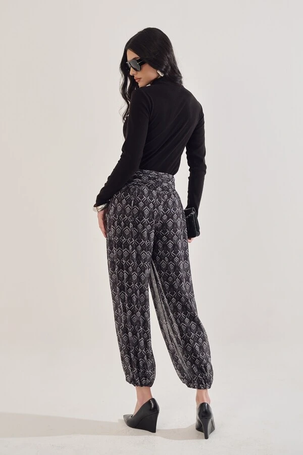 Calça Harem Em Tule Estampado Com Forro