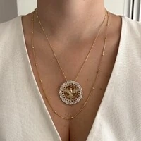 Colar pingente Espírito Santo zircônias ouro