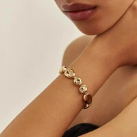 Pulseira bracelete Vega orgânico liso ouro