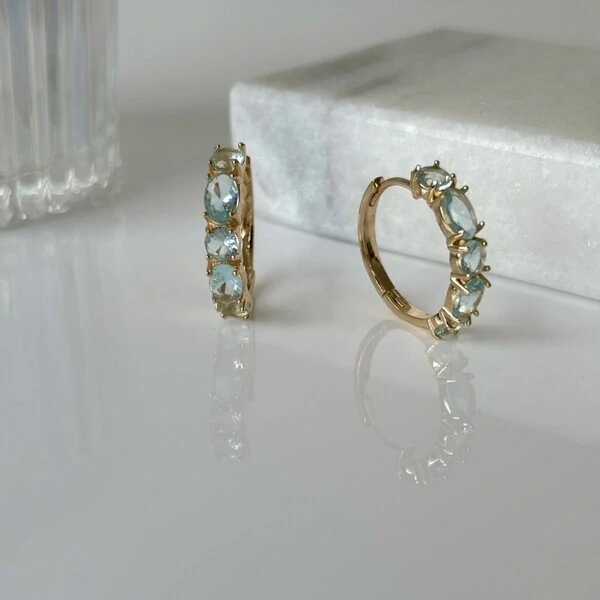 Brinco argola Lana zircônias água marinha ouro