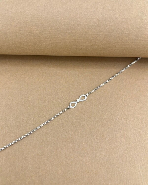 Pulseira Ouro 18k com Centro Formato Infinito Cravado de Brilhantes