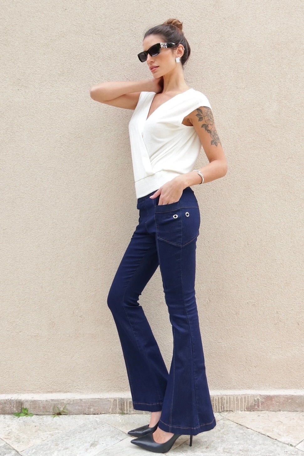 FotoCalça malha jeans flare Bebel