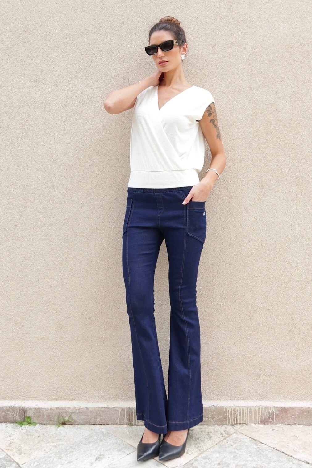 FotoCalça malha jeans flare Bebel