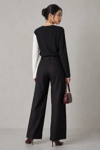 Blusa bicolor manga longa