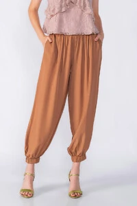 Calca aladim com bolsos