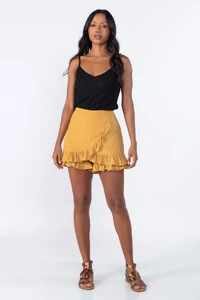 Shorts saia com babados e ziper