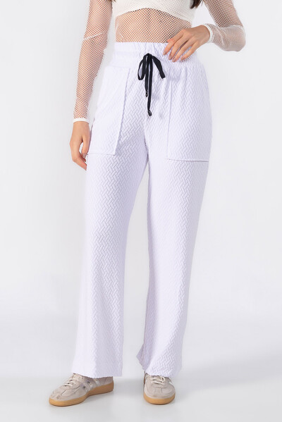 Foto Calça pantalona texturizada com bolsos