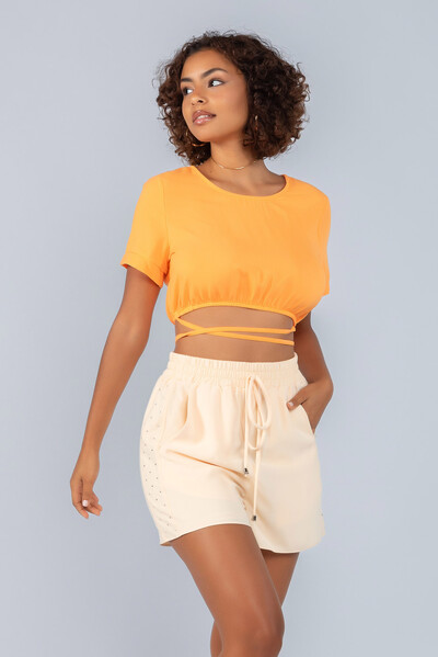 Foto Blusa cropped em crepe elastico e amarracao cintura
