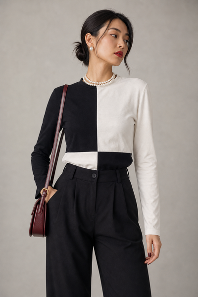 Foto Blusa bicolor manga longa