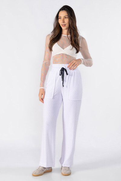 Foto Calça pantalona texturizada com bolsos