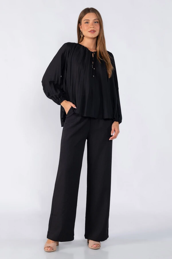 Blusa plissada em crepe