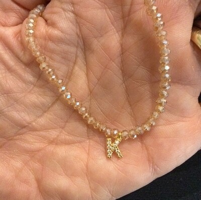 Foto Colar Cristal Dourado com Letra Inicial Cravejada com Zircônias em Dourado