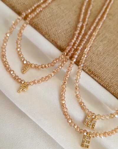 Foto Colar Cristal Dourado com Letra Inicial Cravejada com Zircônias em Dourado