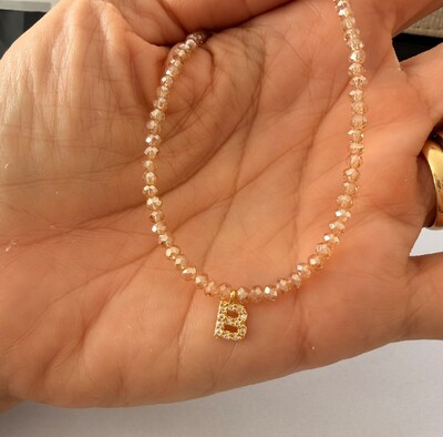Foto Colar Cristal Dourado com Letra Inicial Cravejada com Zircônias em Dourado