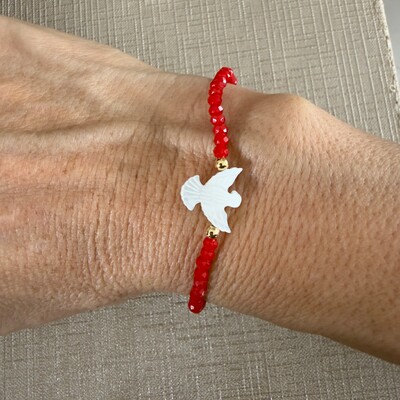 FotoPulseira Cristal com Espírito Santo em Madrepérola