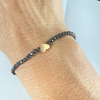 FotoPulseira Cristal no Silicone com Coração de Hematita em Dourado